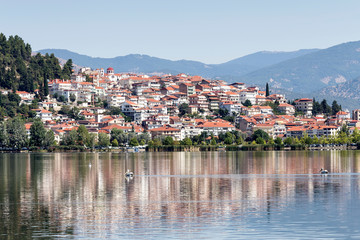 Fototapeta na wymiar Panorama of a mountain lake and the city