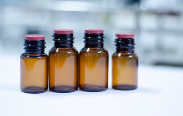 Blank brown bottle reagent in laboratory.