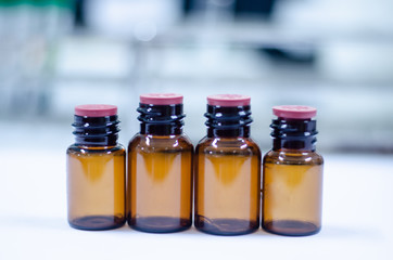 Blank brown bottle reagent in laboratory.