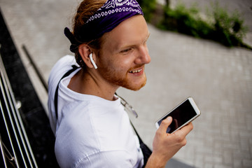 Listening to music time! Enjoy the moment, having funny happy summer mood with modern internet...