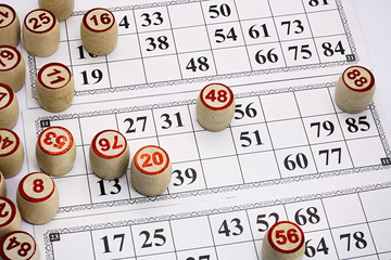 board game lotto, cards with numbers for the game, kegs are on the cards during the game,