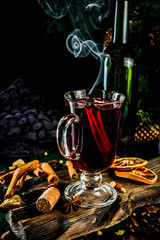 Hot autumn winter drink. Grog, warm tea with spices and dried oranges