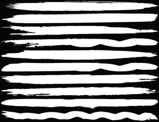 Collection of brush strokes grunge style. Abstract traces from the rollers. White stripes on a black background. Vector abstract elements.