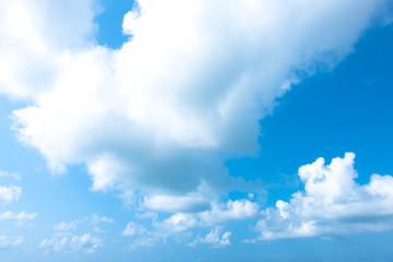 Nature Bright blue Sky with white clouds on blackground. Beautiful sky and clouds in the afternoon.