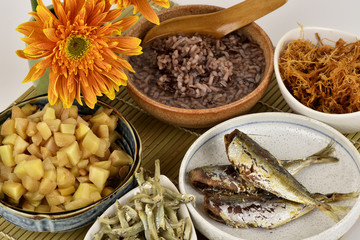 Red rice porridge, healthy breakfast menu on a white background.