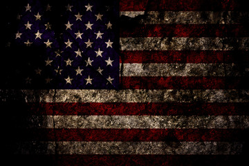 Patriotic military background - grunge and vintage flag of United States of America blended with natural dark grey stone or rock (mixed).