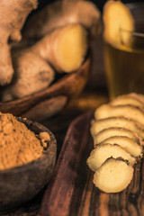 Sliced Ginger Root and Ginger Powder in the Bowl