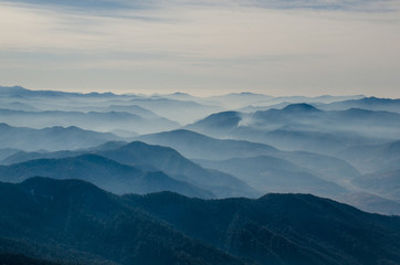 Aerial view of silhouetted  blue mountains