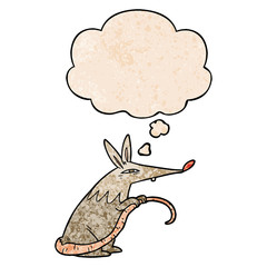 cartoon rat and thought bubble in grunge texture pattern style