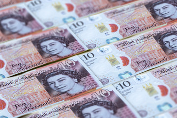 Fototapeta na wymiar UK pounds banknotes background. Money of United Kingdom