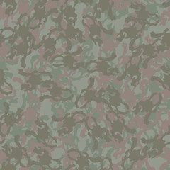 Forest camouflage of various shades of green and brown colors