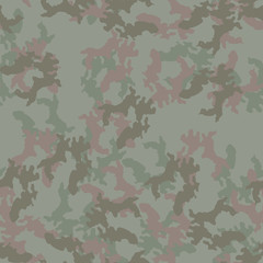 Forest camouflage of various shades of green and brown colors