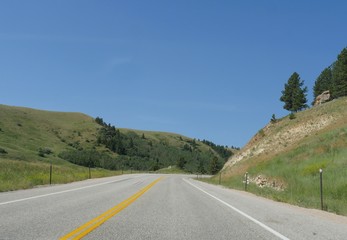 Naklejka premium Beautiful landscape along the smooth paved Highway 16, part of the over one million acres of Bighorn National Forest in northern Wyoming.