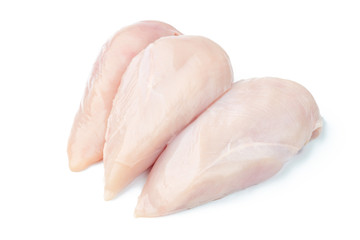 Raw chicken breast filets isolated on white background.