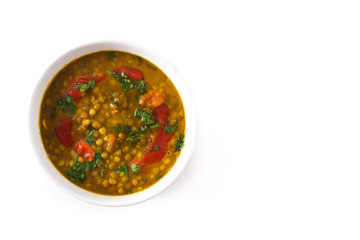 Indian lentil soup dal (dhal) in a bowl isolated on white background. Top view. Copyspace