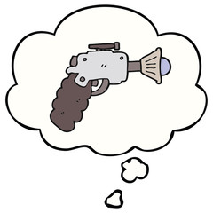 cartoon ray gun and thought bubble