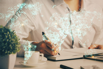 Man's hands working with notes background. Social networking scheme . Mixed media