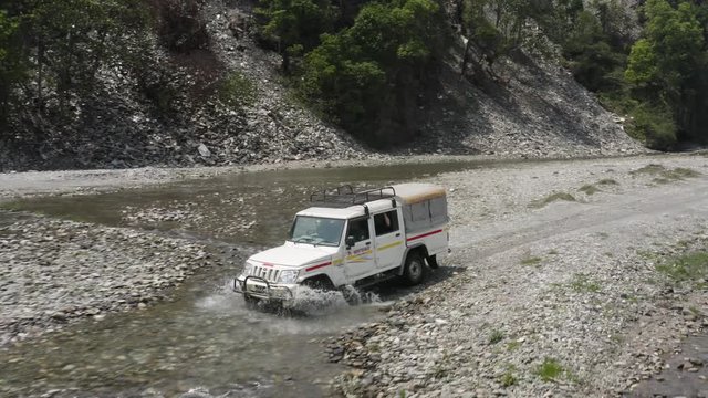 Nepal, anapurna. driving along river. aerial footage