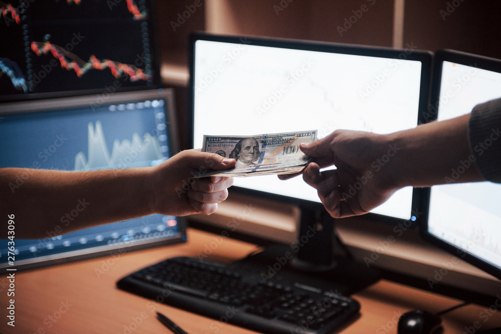 Poster here's your payment. day of salary in the modern office with screens and graphs on them