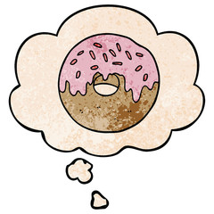 cartoon donut and thought bubble in grunge texture pattern style