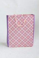 Pink craft pack on a white background with diagonal stripes
