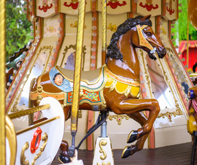 French swing. Horse for riding. Attraction