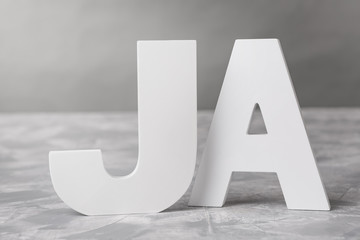JA