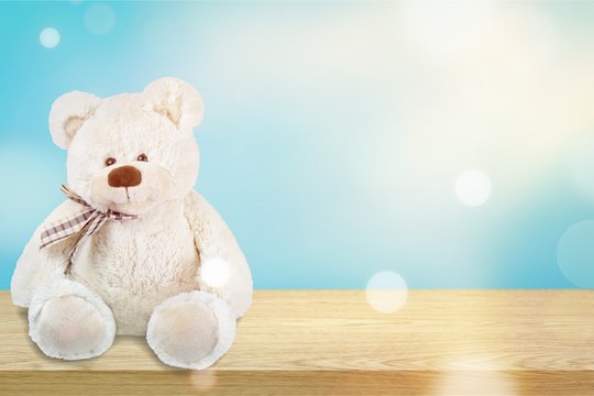 White toy teddy bear isolated on white background
