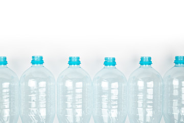Naklejka premium Blue plastic bottles