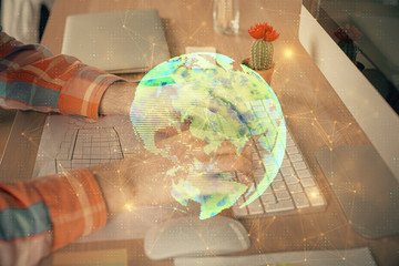 Social network theme hologram with businessman working on computer on background. Concept of world wide web. Double exposure.