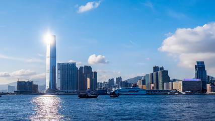 Fototapeta premium Sun light shining over the top of Hong Kong skyline 1
