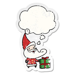 cartoon santa claus and thought bubble as a distressed worn sticker