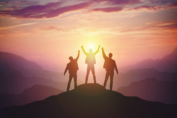 Silhouette of the team on the mountain