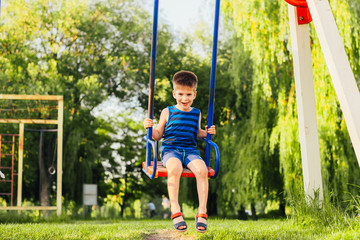 little girl on a swing