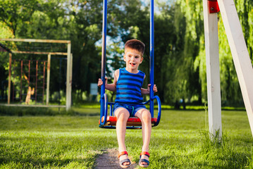 little girl on swing