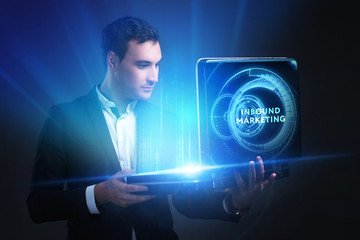 The concept of business, technology, the Internet and the network. A young entrepreneur working on...