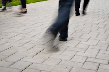 Crowd of people walking on street with motion blur movement  effect .