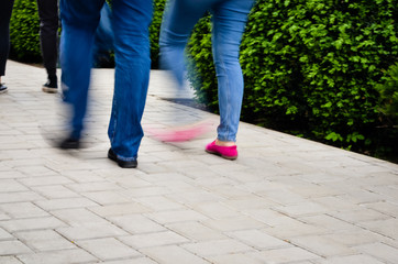 People  walking on street - Motion Blur effect .