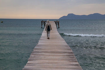 Person walking on jetty at Mallorca Coast