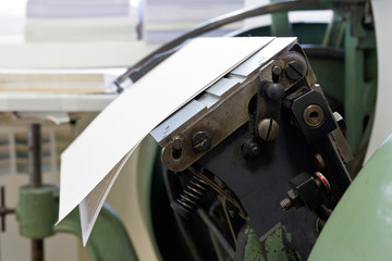 Machine for stitching book pages. Elements of the machine.