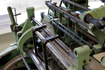 Machine for stitching book pages. Elements of the machine.