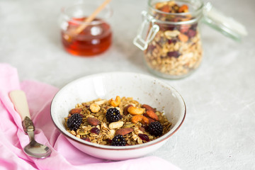 Granola with yogurt, honey and berries. Breakfast with berries and nuts. The correct breakfast....