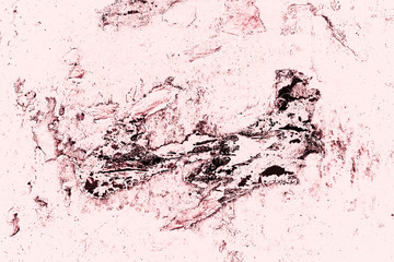 Vintage pink background. Rough painted wall of fiesta color. Imperfect plane of rosy colored. Uneven old decorative toned backdrop of rouge tint. Texture of pink hue. Ornamental stony surface.
