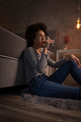 Woman tasting wine