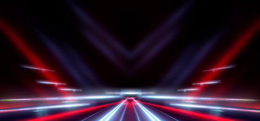 Abstract light tunnel. Night view of the road in the tunnel. Abstract lines and rays of neon light....