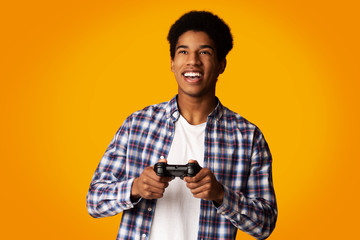 Excited Guy Holding Joystick and Playing Video Games