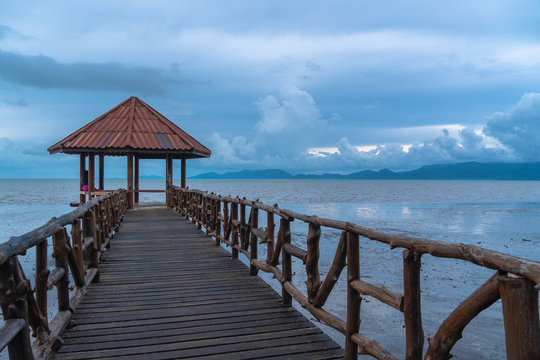 wooden bridge along the black beach..pavilion at black beach view point Trat Thailand