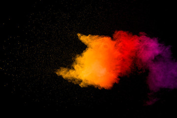 Explosion of multicolored dust on black background. - 276365005