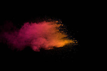 Explosion of multicolored dust on black background. - 276365018