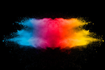 Explosion of multicolored dust on black background. - 276365204